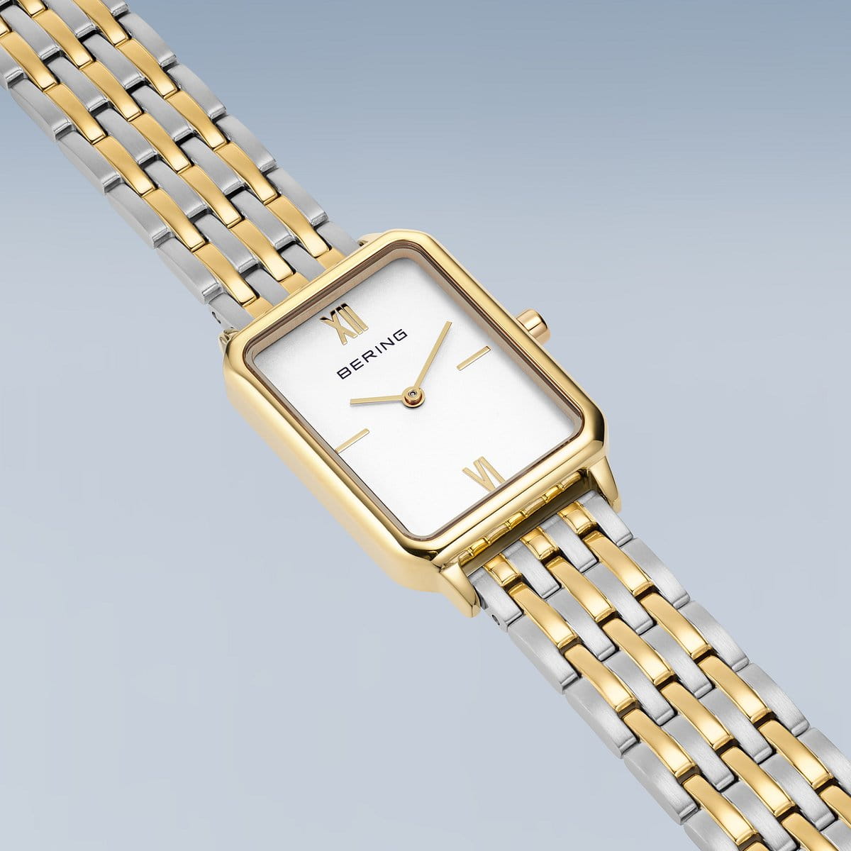 Bering - Classic | poleret guld | 17423-714 set liggende. bicolor lænke og firkantet skive.