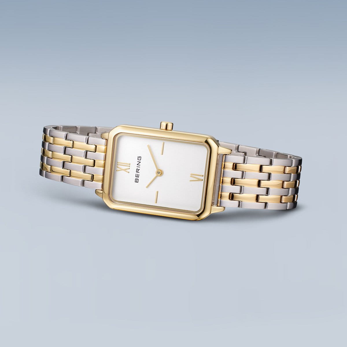 Bering - Classic | poleret guld | 17423-714 set liggende på siden. bicolor lænke og firkantet skive.
