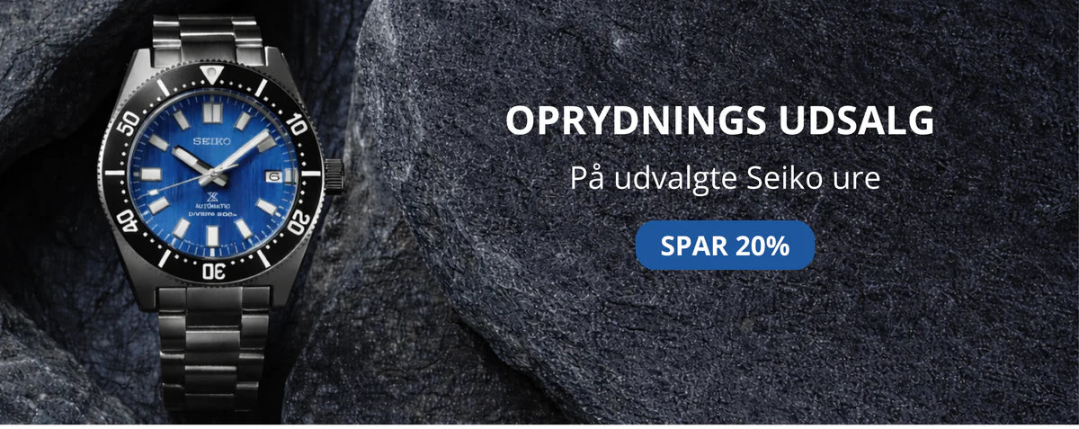 Seiko kampagnebillede med blå Prospex dykkerur på mørke sten og teksten Oprydnings udsalg – på udvalgte Seiko ure, spar 20%.