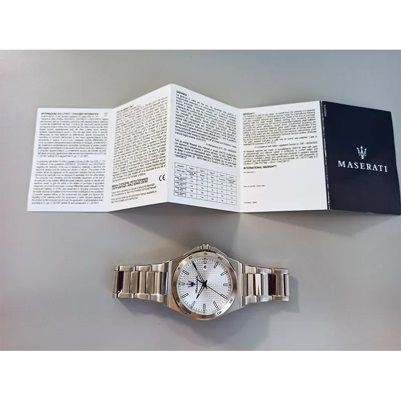Maserati Velocità Slim R8853153006 med garantihæfte vist sammen med uret
