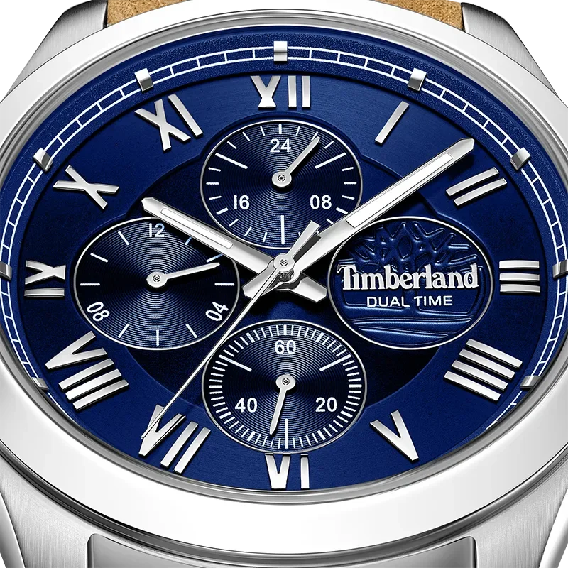 Nærbillede af Timberland Ashmont TDWGF0082602 med blå skive, dual time detaljer og romertal