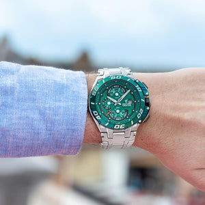 Festina F20754/5 Chrono Bike på håndled med grøn urskive, stållænke og sporty herreurdesign.