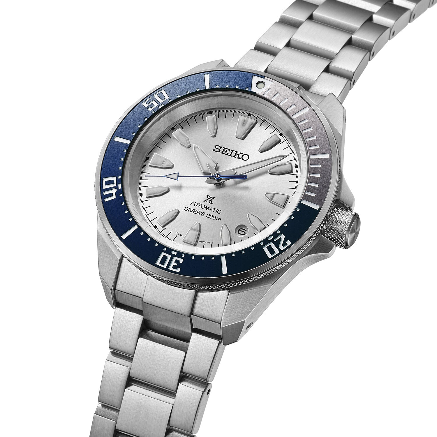 Seiko Prospex HBB001K1 automatisk herreur i rustfrit stål med sølvfarvet urskive, stållænke og dykkerinspireret blå/grå krans.