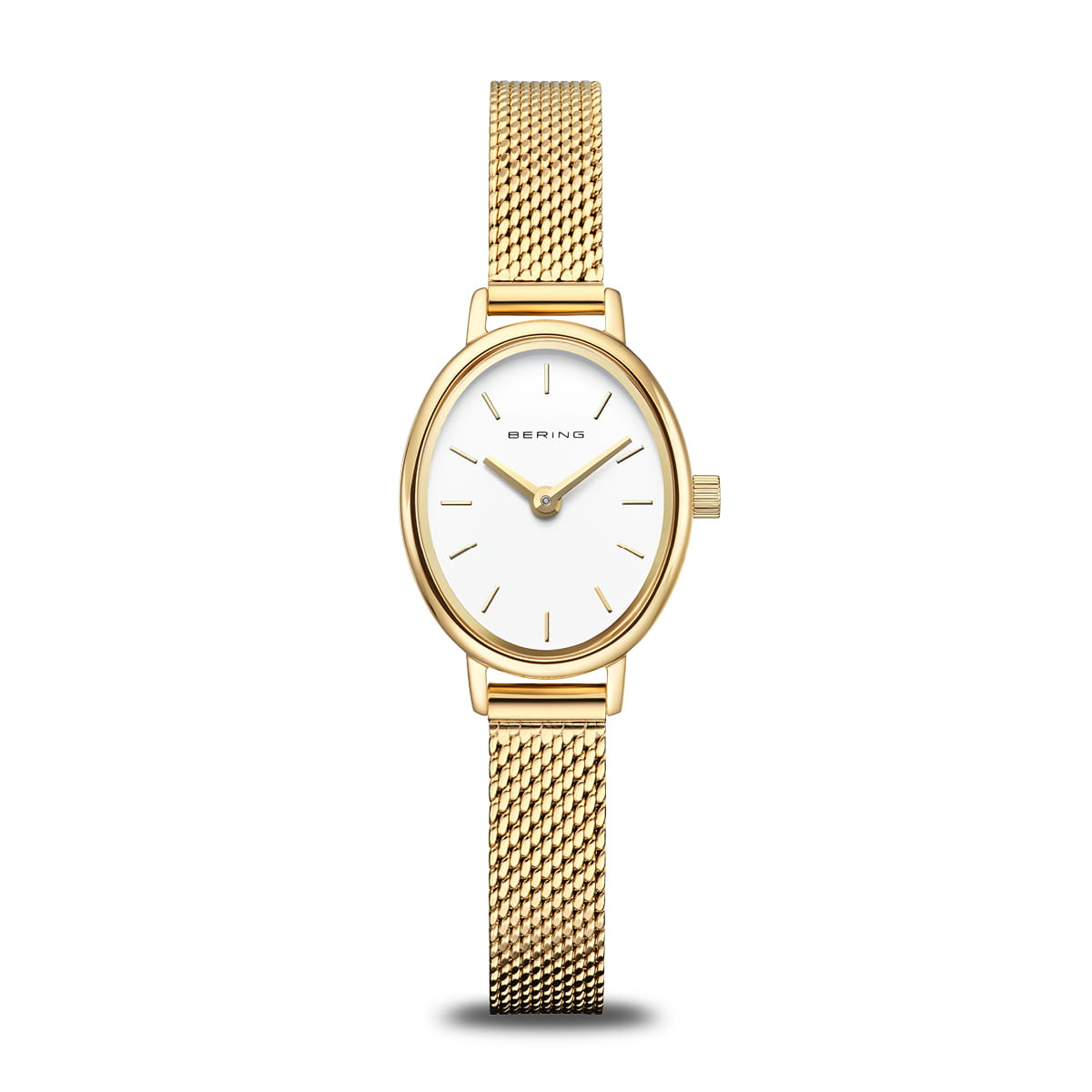 Bering Classic dameur model 11020-334 med oval urkasse i poleret guld, hvid urskive, slank Milanaise-rem og fladt safirglas – elegant og tidløst design