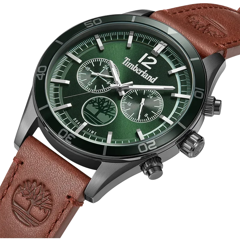 Nærbillede af Timberland Ashmont TDWGF0011203 med grøn skive, sorte trykknapper og brun læderrem