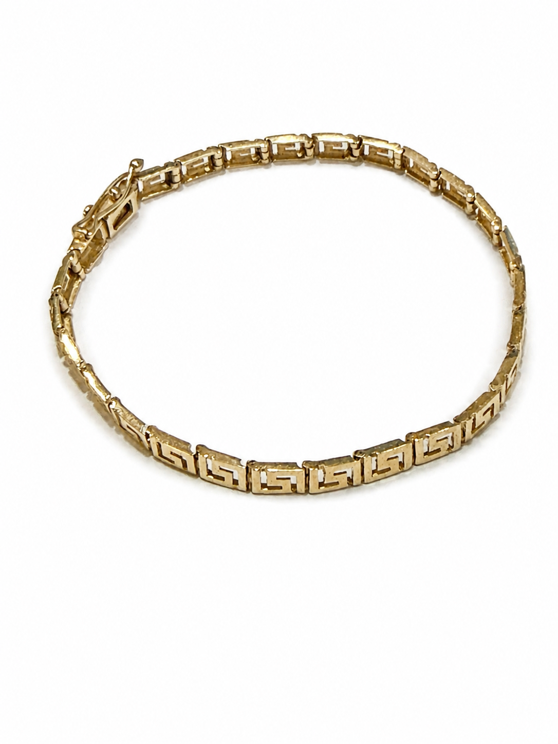 Brugt armbånd i 14 kt. med græsk inspireret mønster set forfra [ai-redigeret]