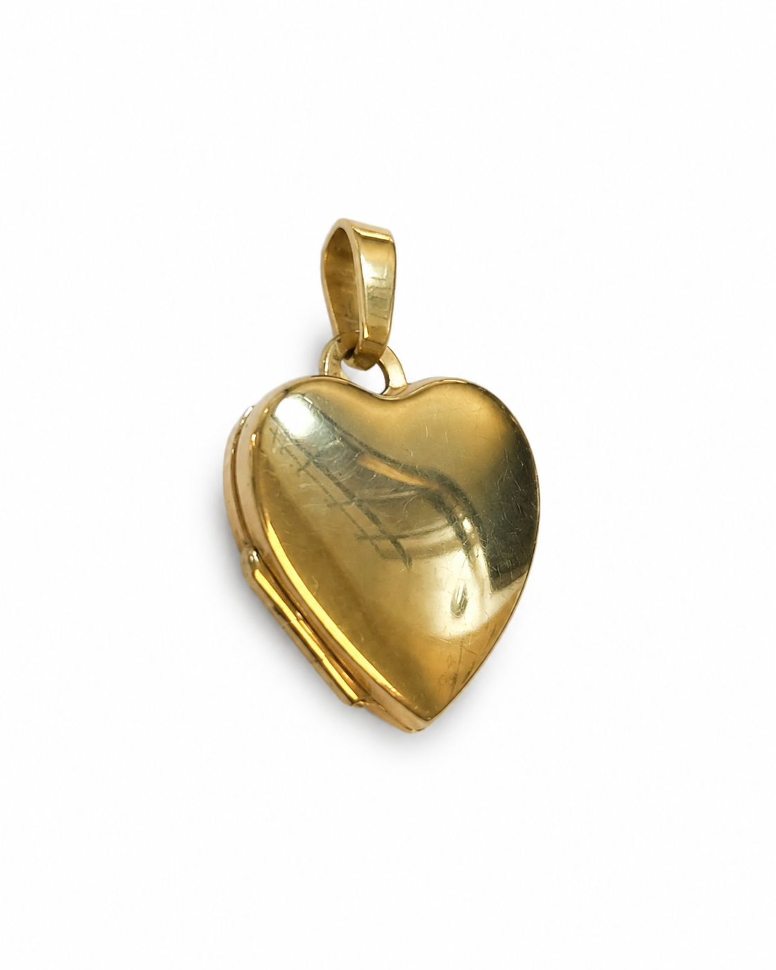 Brugt hjerte-medaljon i 8 kt. guld set fra siden - BRUGT0052 [ai-redigeret]