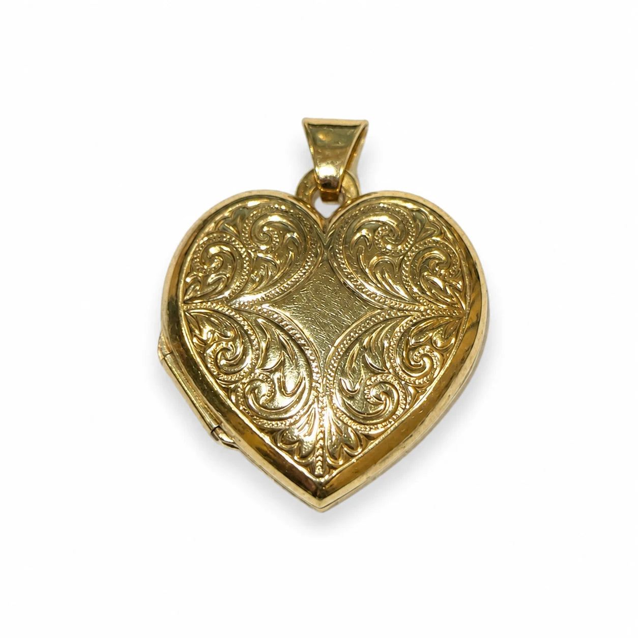 Brugt hjerte-medaljon i 9 kt. guld med ornamenteret front - BRUGT0076 [ai-redigeret]