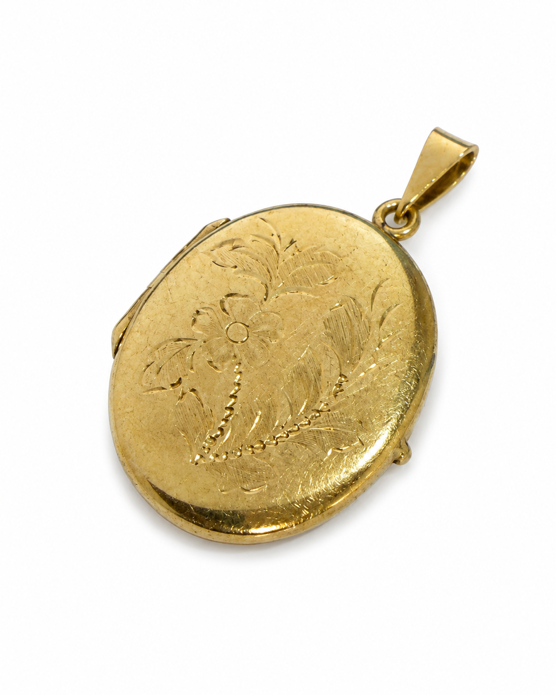 Oval medaljon 14 kt. med graveret blomstermotiv set fra bagsiden [ai-redigeret]