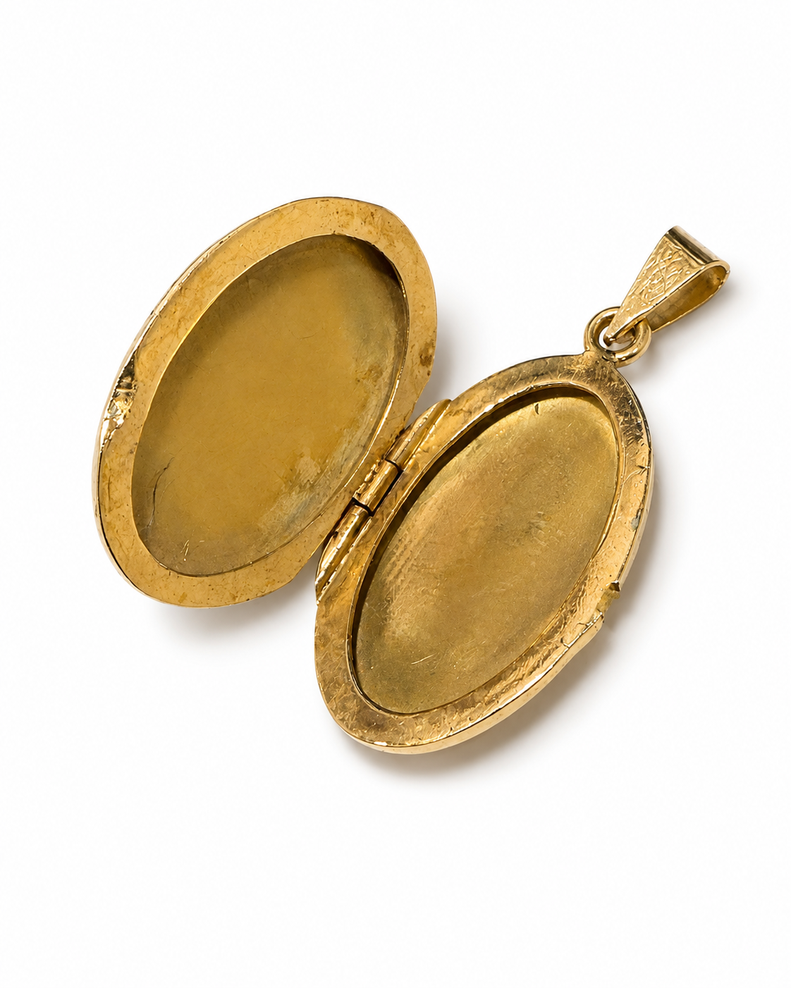 Åben oval medaljon i 14 kt. med synlig inderside [ai-redigeret]
