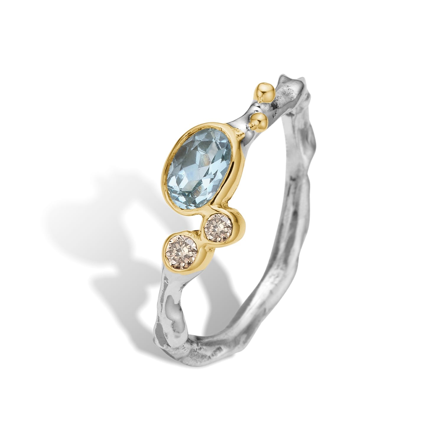 ByBirdie Grace Single Blue Aqua Faceted Ring i 925 sterlingsølv med facetteret blå akvamarin, 14 karat guld og brillantslebne diamanter.