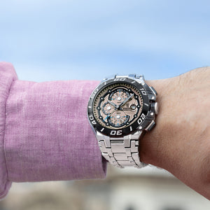 Festina F20754/2 Chrono Bike på håndled med brun urskive, stållænke og sporty herreurdesign.