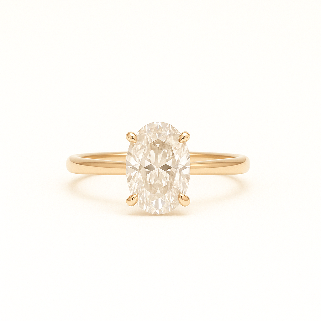 Solitaire ring i 14kt guld med 1,50 ct oval cut labgrown diamant fra ALMA Collection. Frontvisning af blankpoleret ringskinne og stor centreret oval diamant i dansk design. [ai-redigeret]