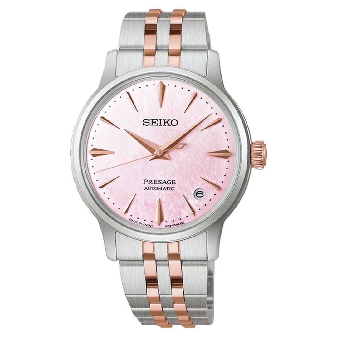 Seiko Presage Cocktail SRPM06J1 dameur med rosa perlemorsskive, guldfarvede markeringer og tofarvet stållænke set forfra
